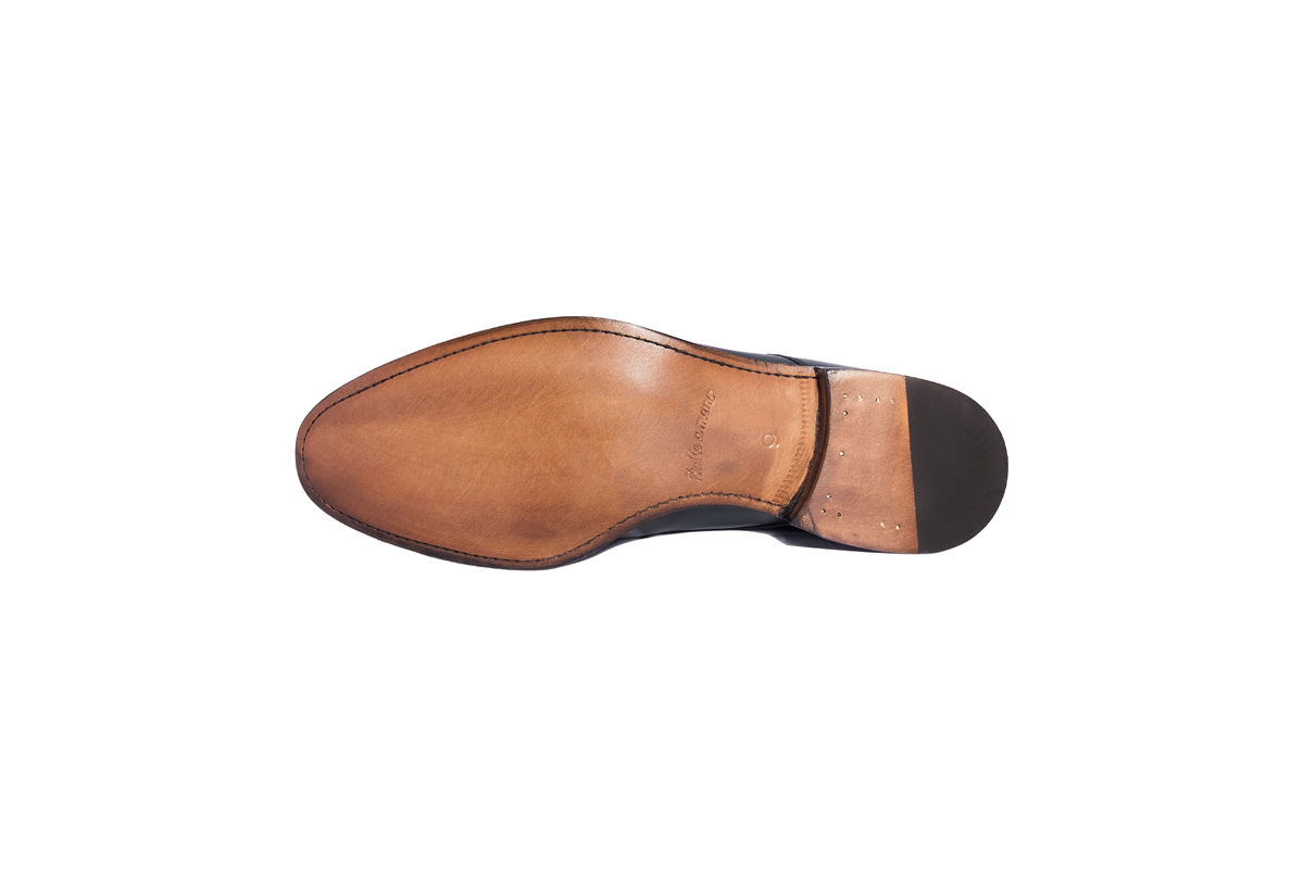 Monk-strap-pelle-invecchiata-fondo-cuoio.jpg